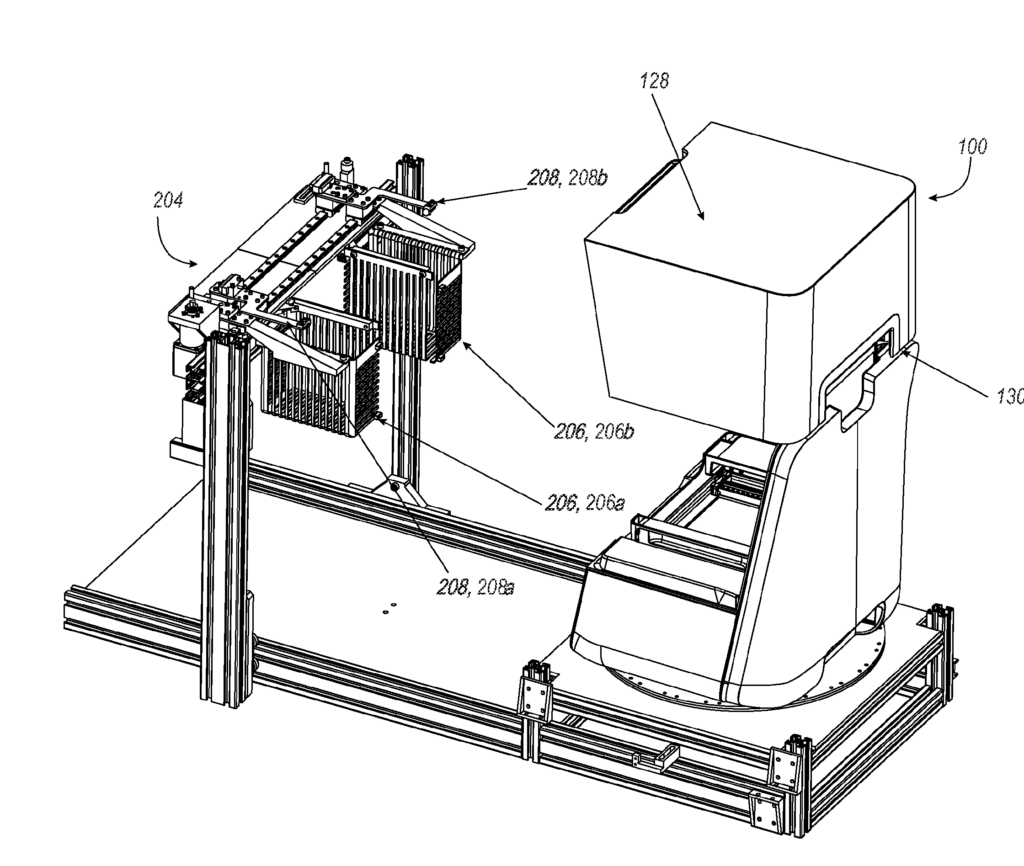 Perspective view of an illustrative automated parts removal and collection system coupled to an additive fabrication device